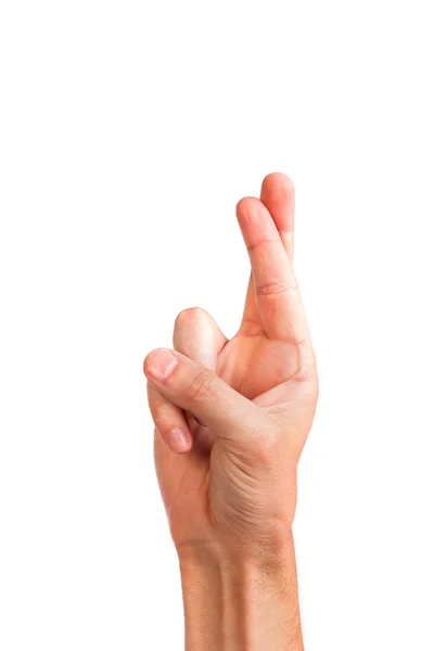 Dedos cruzados simbolizando boa sorte isolado em branco — Fotografia de Stock