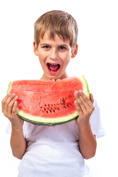 Chłopiec jest jedzenie arbuza — Zdjęcie stockowe