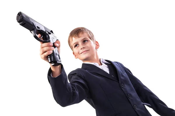 Ung pojke anläggning pistol — Stockfoto