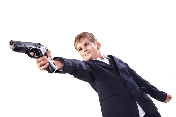 Ung pojke anläggning pistol — Stockfoto