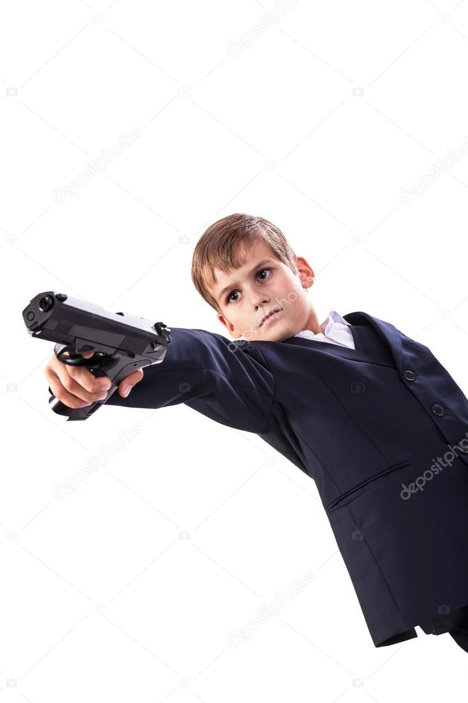 Young boy with gun