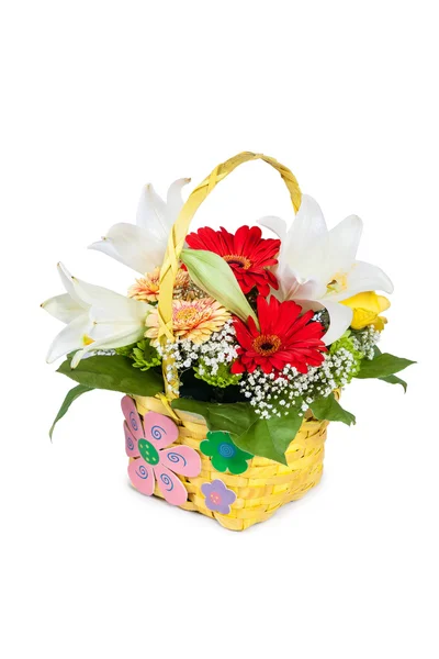 Beautiful bouquet of bright flowers in basket — Stock Photo, Image