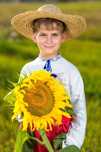 Cute child in traditional Ukrainian clothes outdoor — Stock Photo, Image