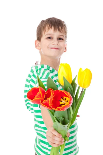 Niño sosteniendo tulipanes —  Fotos de Stock