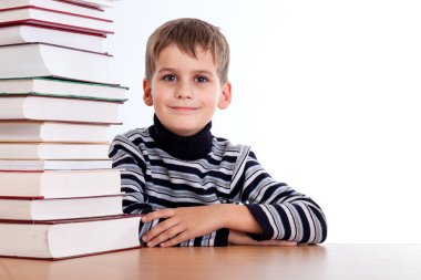 öğrenci ve bir yığın kitap