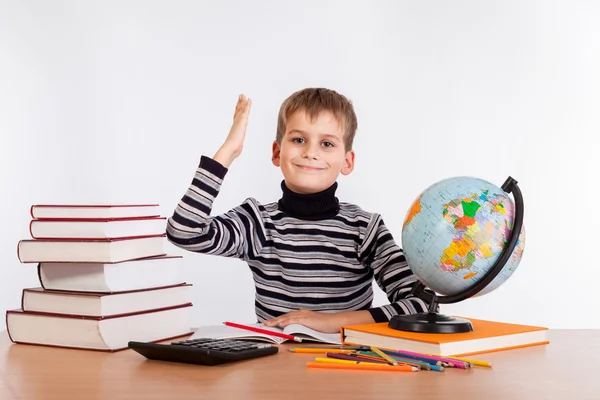 Cheerful Schoolboy ready to answer question Stock Picture