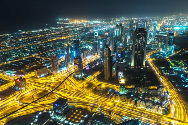 Dubai downtown night scene with city lights — Stock Photo, Image