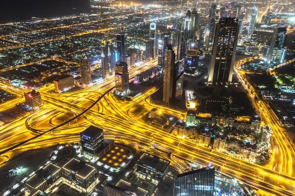 Dubai downtown night scene with city lights — Stock Photo, Image