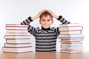öğrenci ve bir yığın kitap