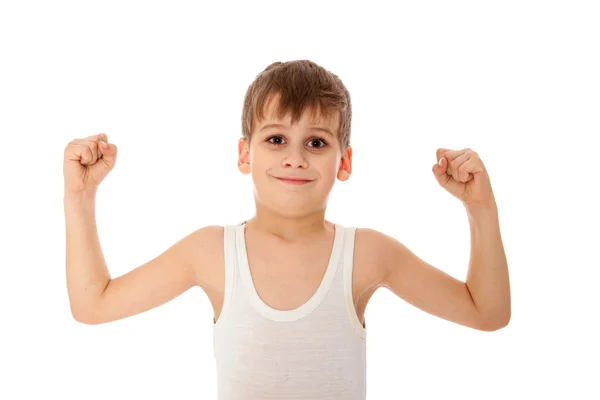 Junge zeigt seine Muskeln — Stockfoto