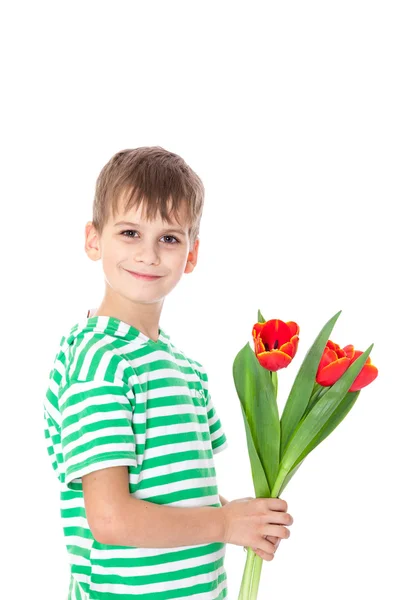 Kleiner Junge mit Tulpen — Stockfoto