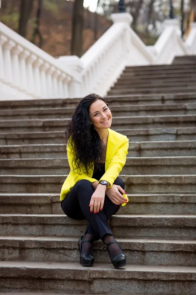 Beautiful Woman on staircase — Stock Photo, Image