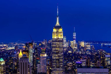 NEW YORK CITY, USA - MARCH 15, 2020: Panoramic aerial view of Manhattan at night in New York City, NY, USA