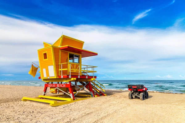 Lifeguard tower and a beach rescue car in South beach, Miami Beach in a sunny day, Florida