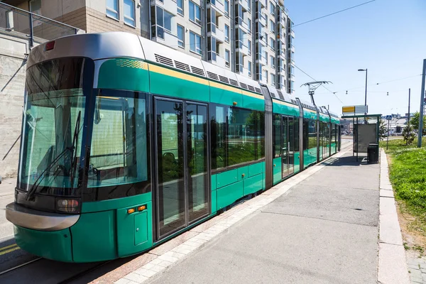 Public transport, modern tram in Helsinki in a beautiful summer day, Finland