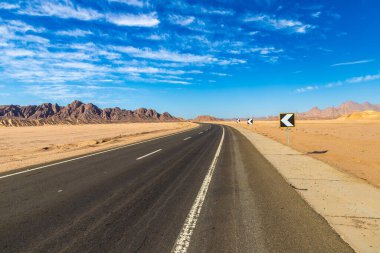 Road in Sahara desert in Egypt in a sunny day
