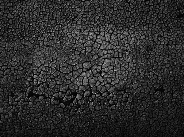 Fondo de textura abstracta agrietada negra . —  Fotos de Stock