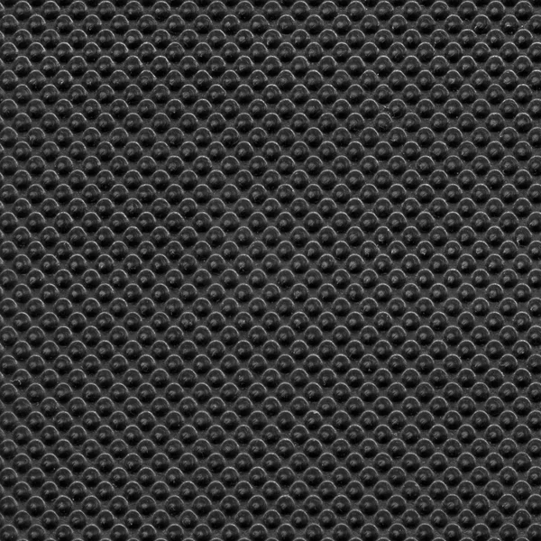 Černý gumový textury closeup pozadí. — Stock fotografie