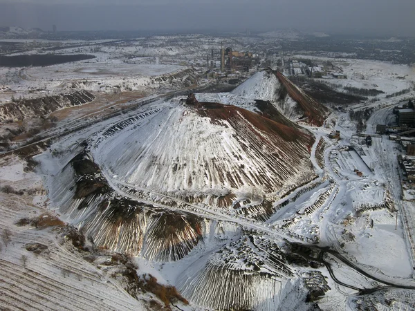 Snow-covered slagheap (aerial view). — Stock Photo, Image