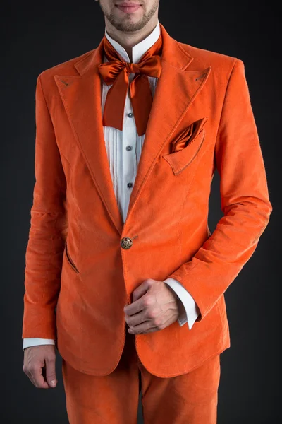 Orange suit orange bow tie — Stock Photo, Image