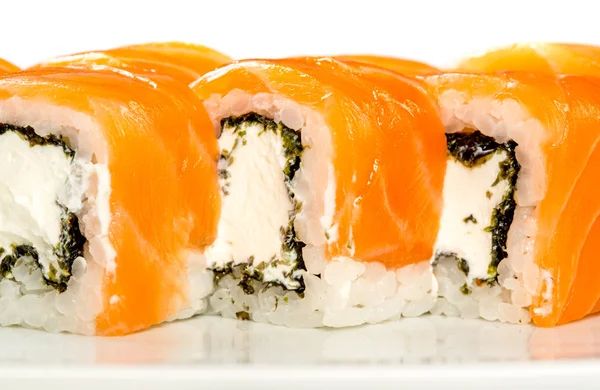 Sushi (rulle unagi maki syake) på en vit bakgrund — Stockfoto