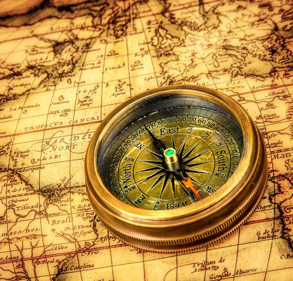 Old Vintage Compass On Ancient Map — Stock Photo © Dmitryrukhlenko