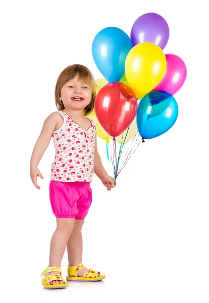 Holčička s balónky úsměvem. — Stock fotografie