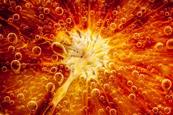 Citrus dicht abstract omhoog met bubbels, achtergrond — Stockfoto
