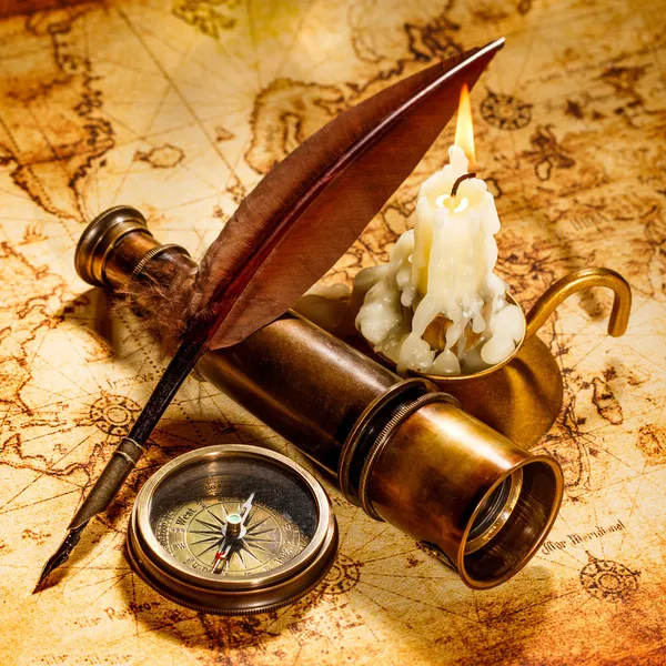 Vintage still life. Vintage items on ancient map. — Stock Photo, Image