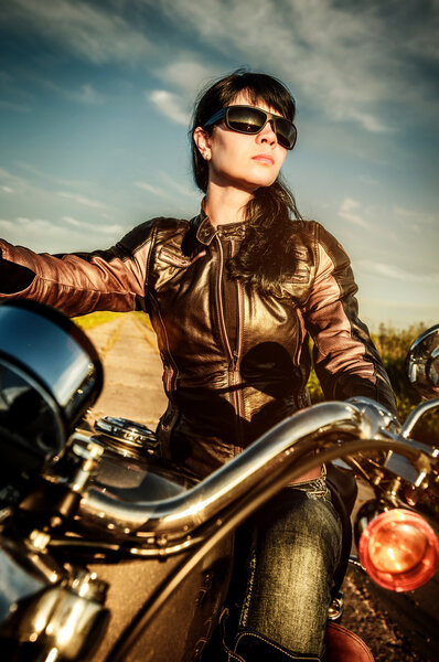 Biker girl on a motorcycle