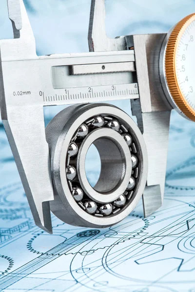 Ball bearings and Metal vernier caliper — Stock Photo, Image