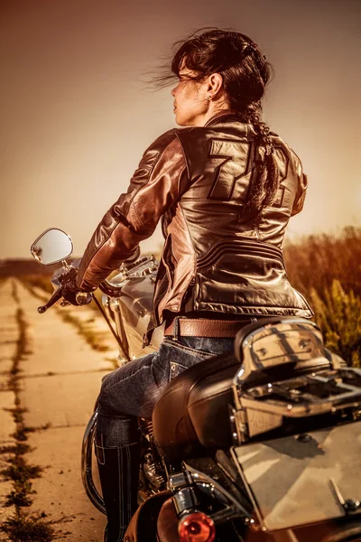 Biker girl on a motorcycle — Stock Photo, Image