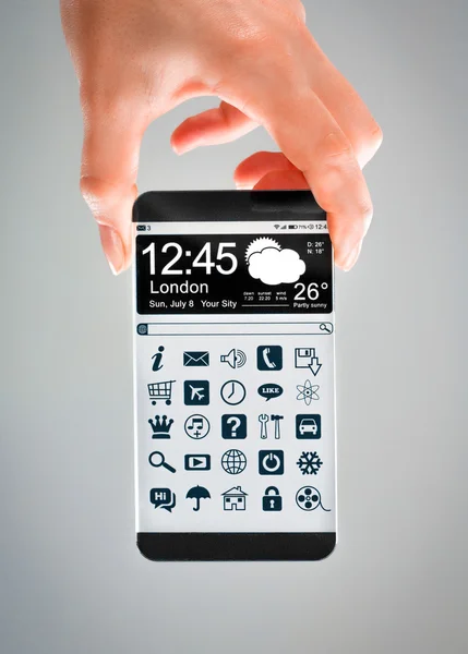 Smartphone-val emberi kéz átlátható képernyő. — Stock Fotó