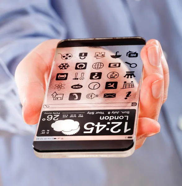Smartphone met transparante scherm in menselijke handen. — Stockfoto