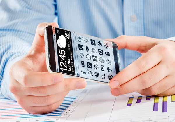 Smartphone with transparent screen in human hands. — Stock Photo, Image