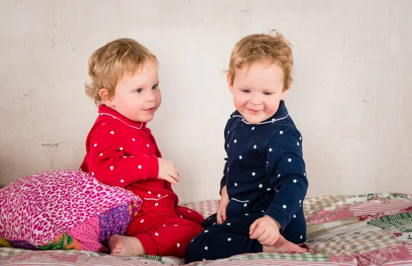 Children on the bed — Stock Photo, Image