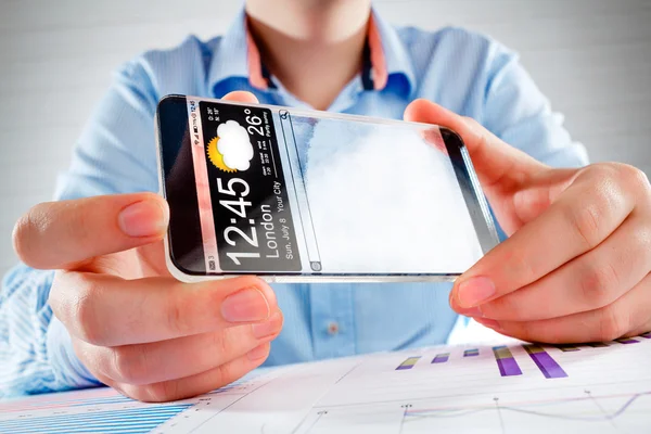 Smartphone with transparent screen in human hands. — Stock Photo, Image