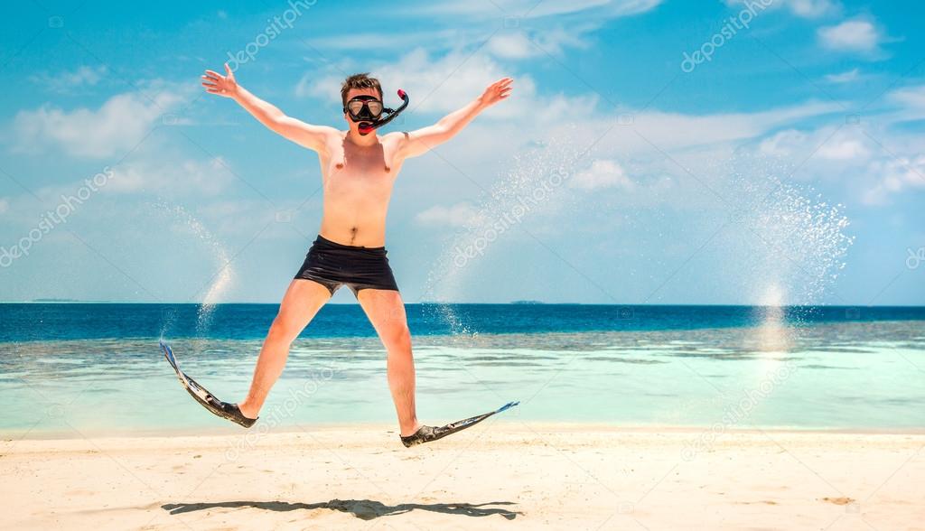 Funny man jumping in flippers and mask. Stock Photo by ©cookelma 43606101 Funny man jumping in flippers and mask. Stock Photo by ©cookelma 43606101