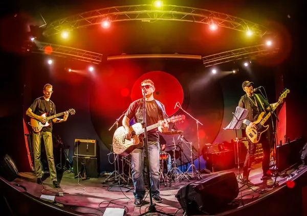 Band performs on stage in a nightclub — Stock Photo, Image