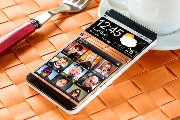 Smartphone with a transparent display. — Stock Photo, Image