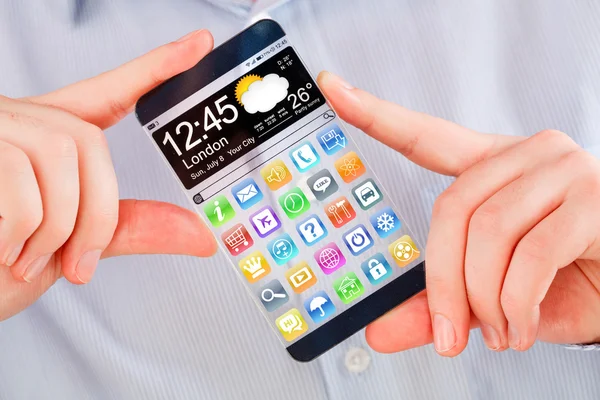 Smartphone con pantalla transparente en manos humanas . — Foto de Stock