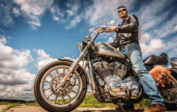Biker on bike Harley Sportster