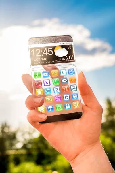 Smartphone com tela transparente em mãos humanas . — Fotografia de Stock