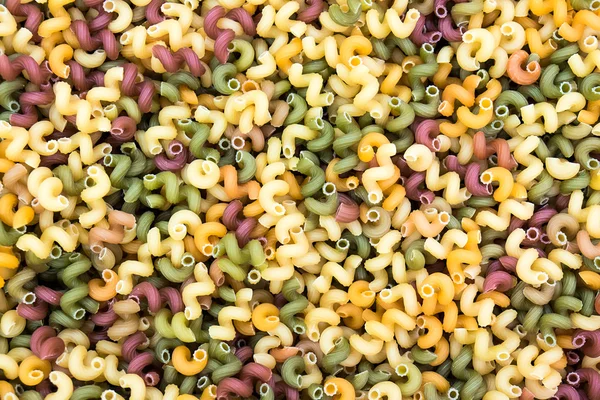 Background from multicolored pasta — Stock Photo, Image