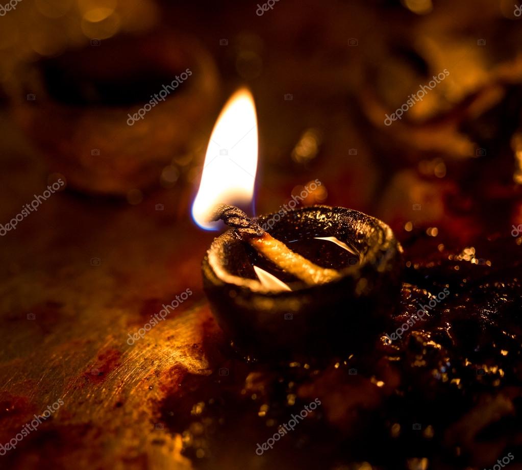 Burning candles in the Indian temple. — Stock Photo © cookelma 49876331