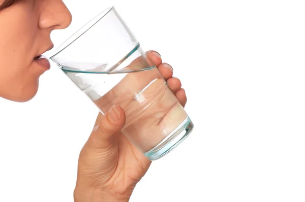 Woman drinking mineral water — Stock Photo, Image