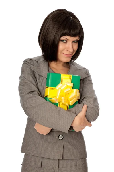 Groene doos met gele boog als een geschenk — Stockfoto