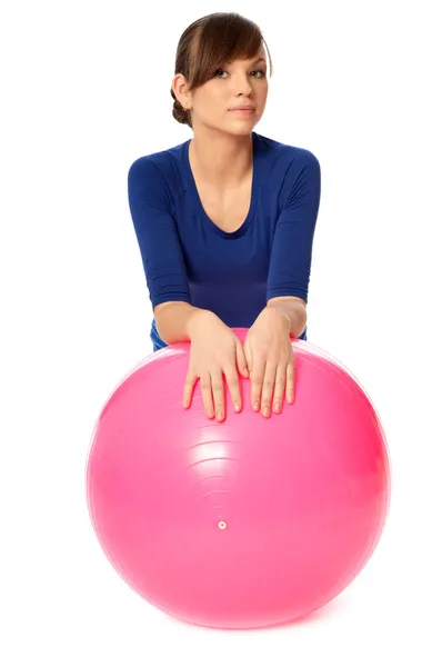 Ejercicios en una pelota de gimnasia —  Fotos de Stock