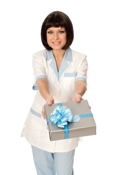 Doctor with a gift — Stock Photo, Image