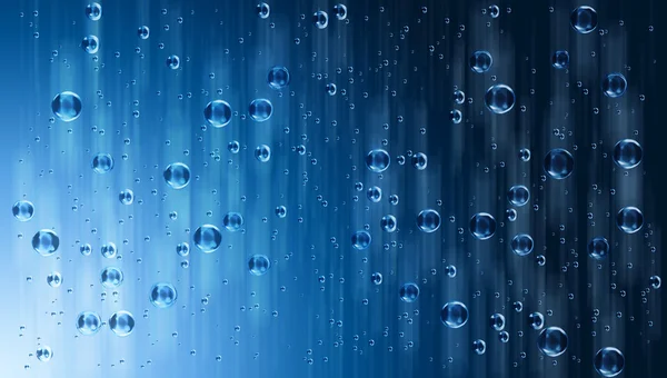 Movimento gotas de água azul na chuva — Fotografia de Stock